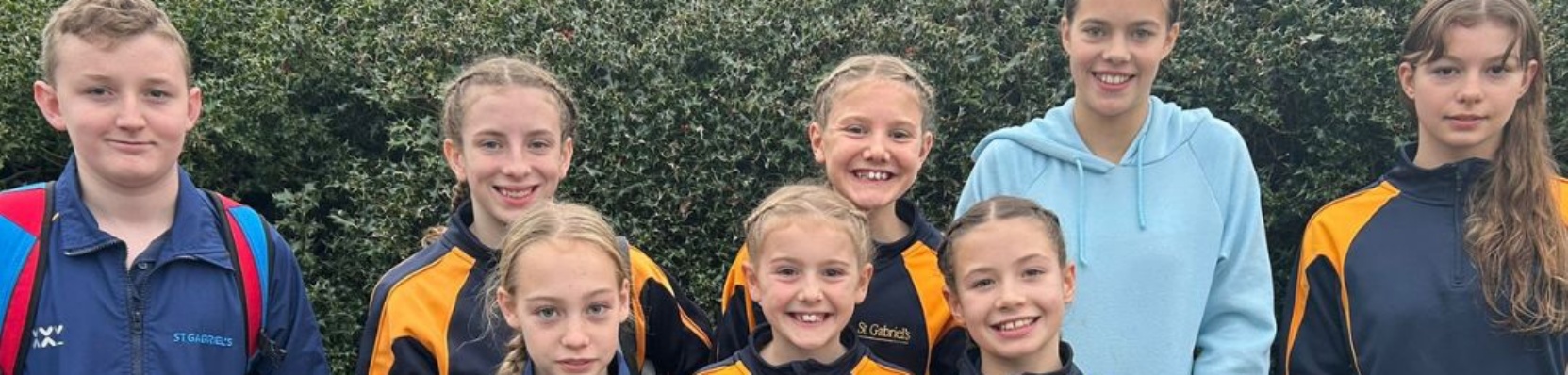 Group of pupils standing together after a swimming gala